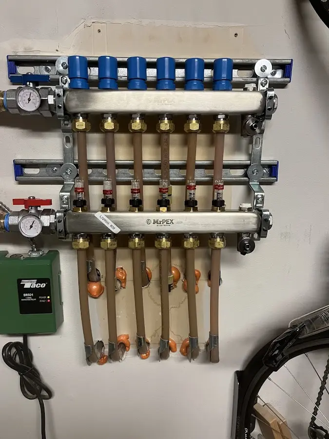 Plumber performing Water Heater Repair at a residential property in Kingsville